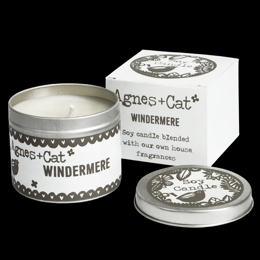 Lumaysa Windermere fresh soy candle in silver tin with box and lid on elegant black background, premium product display.
