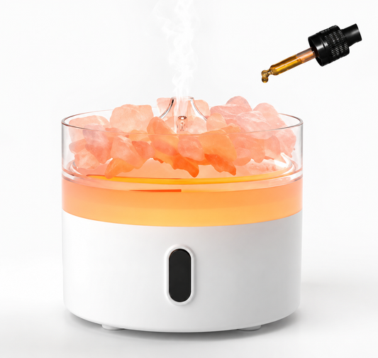 Himalayan salt lamp with pink crystals on a white background