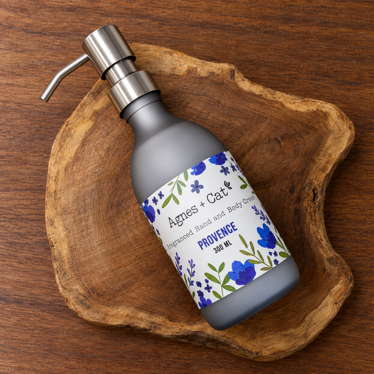 Agnes + Cat Provence Hand and Body Cream 300ml displayed diagonally on a natural wooden tray with a clean rustic background.