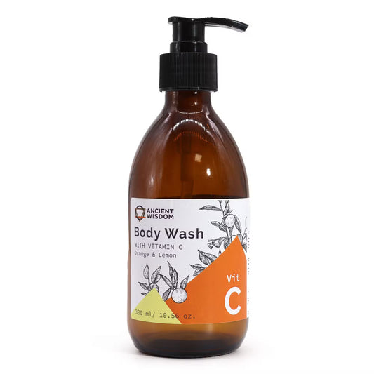 Lumaysa Citrus Glow Body Wash with Vitamin C in amber pump bottle isolated on a clean white background