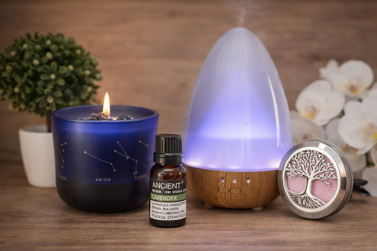 Lumaysa Home Fragrance hero image featuring a lit zodiac soy candle, ultrasonic aroma diffuser with soft ambient light, lavender essential oil, and elegant car diffuser styled on a natural wooden background.
