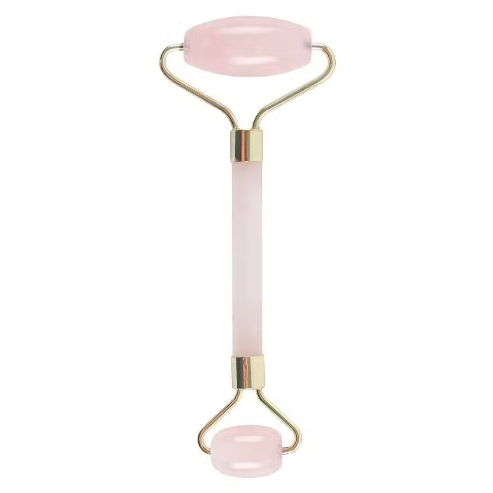 Lumaysa Gemstone Glow rose quartz facial roller with soft pink gemstone and gold-toned brass frame