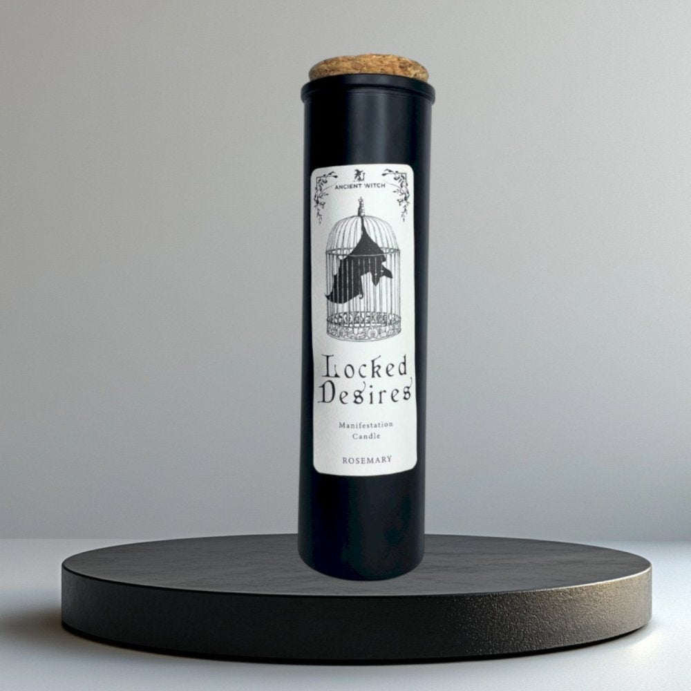 Locked Desires Ritual Candle – matte black rosemary candle tube standing on a minimalist black display stand.