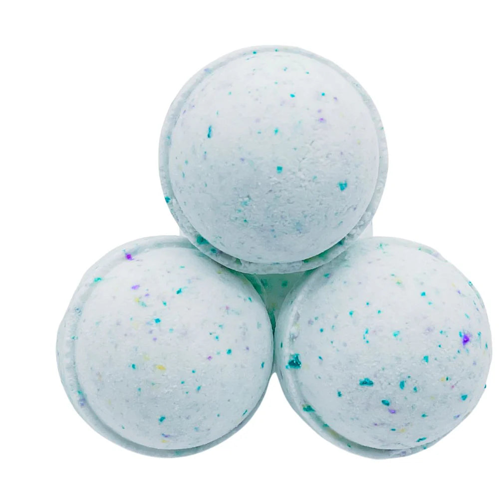 Lumaysa Ocean Breeze spa bath bombs in soft aqua blue colour, handmade luxury bath bombs with sea salt and shea butter for refreshing coastal relaxation