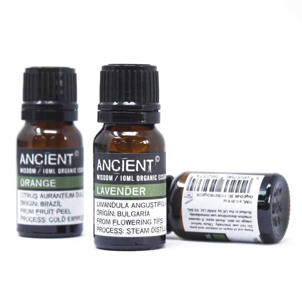 Lumaysa essential oil collection featuring Pure Lavender and Orange oils, organic aromatherapy oils in amber glass bottles.