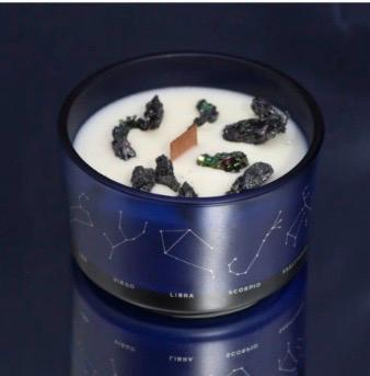 Blue Zodiac crystal soy candle with decorative crystals and a wooden wick