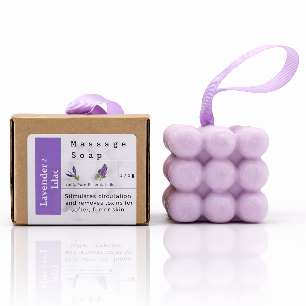 lavender and lilac massage soap bar with packaging, handmade body sculpt soap with bubble texture and ribbon on reflective surface