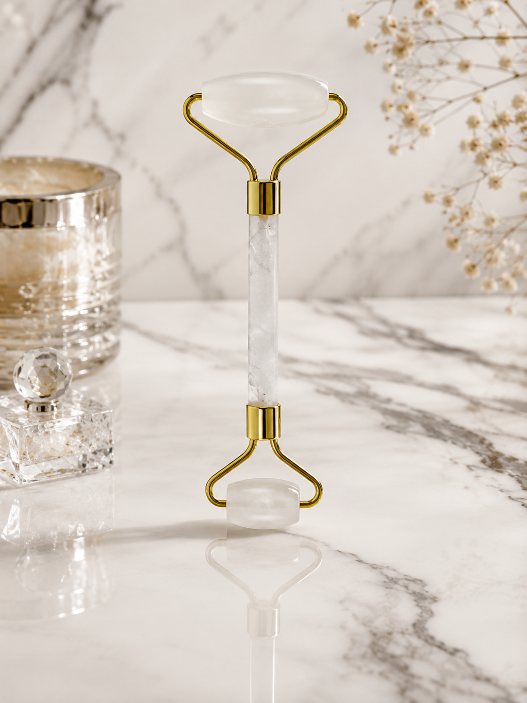 Glowing crystal roller on a marble surface with decorative elements