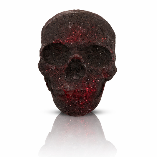 Black skull bath bomb with red shimmer on white background with reflection – Lumaysa Dark Whisper Halloween bath bomb (40g)