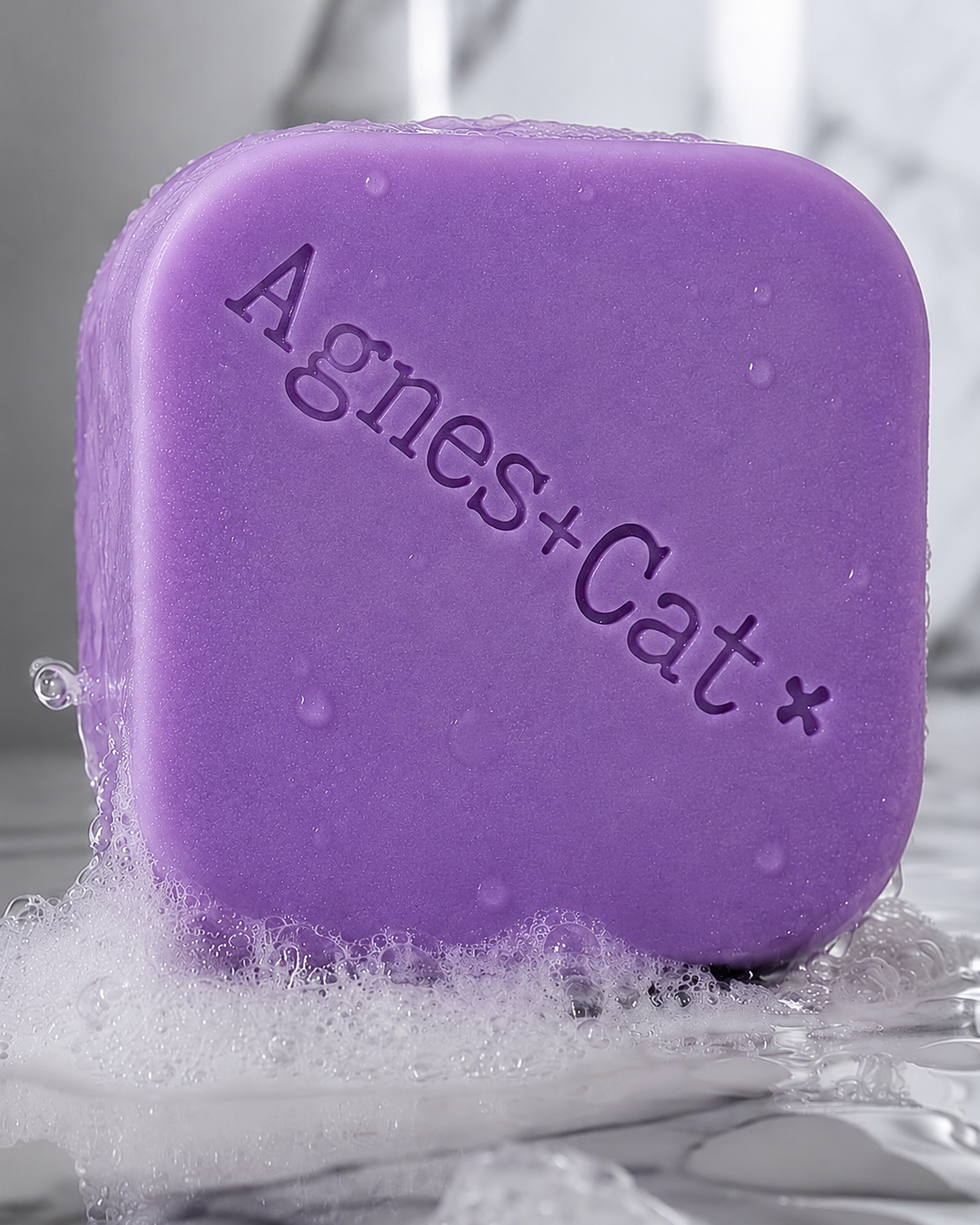 Purple Pressed Peonies Solid Shampoo Bar with water droplets and natural foam
