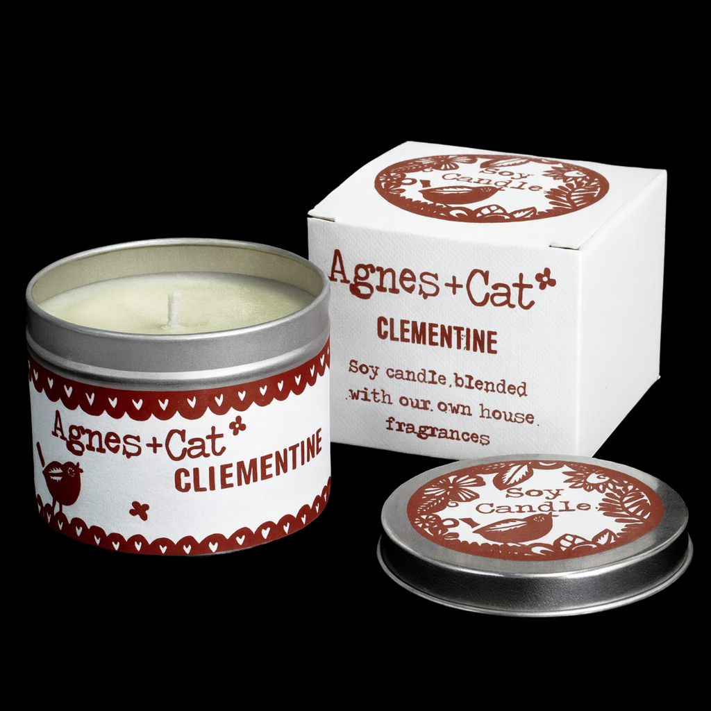 Lumaysa Clementine soy candle in silver tin with branded box and lid on white background