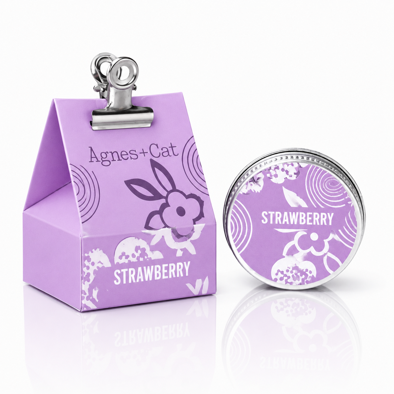 Lumaysa Strawberry Bliss vegan lip balm by Agnes & Cat with decorative gift-style packaging and metal tin, clean studio background.