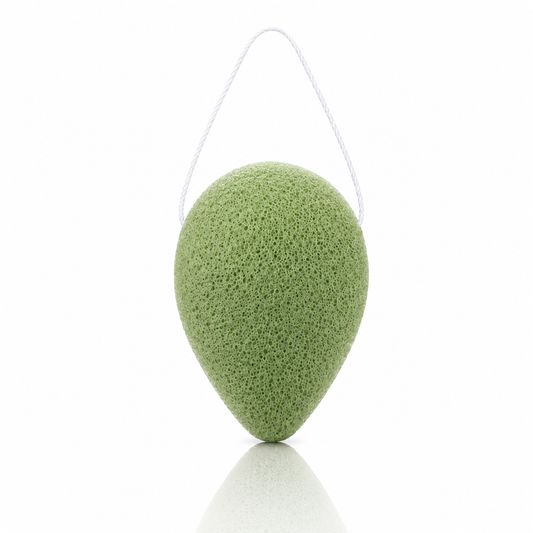 Antioxidant green tea konjac sponge with a white hanging string on a clean white background.