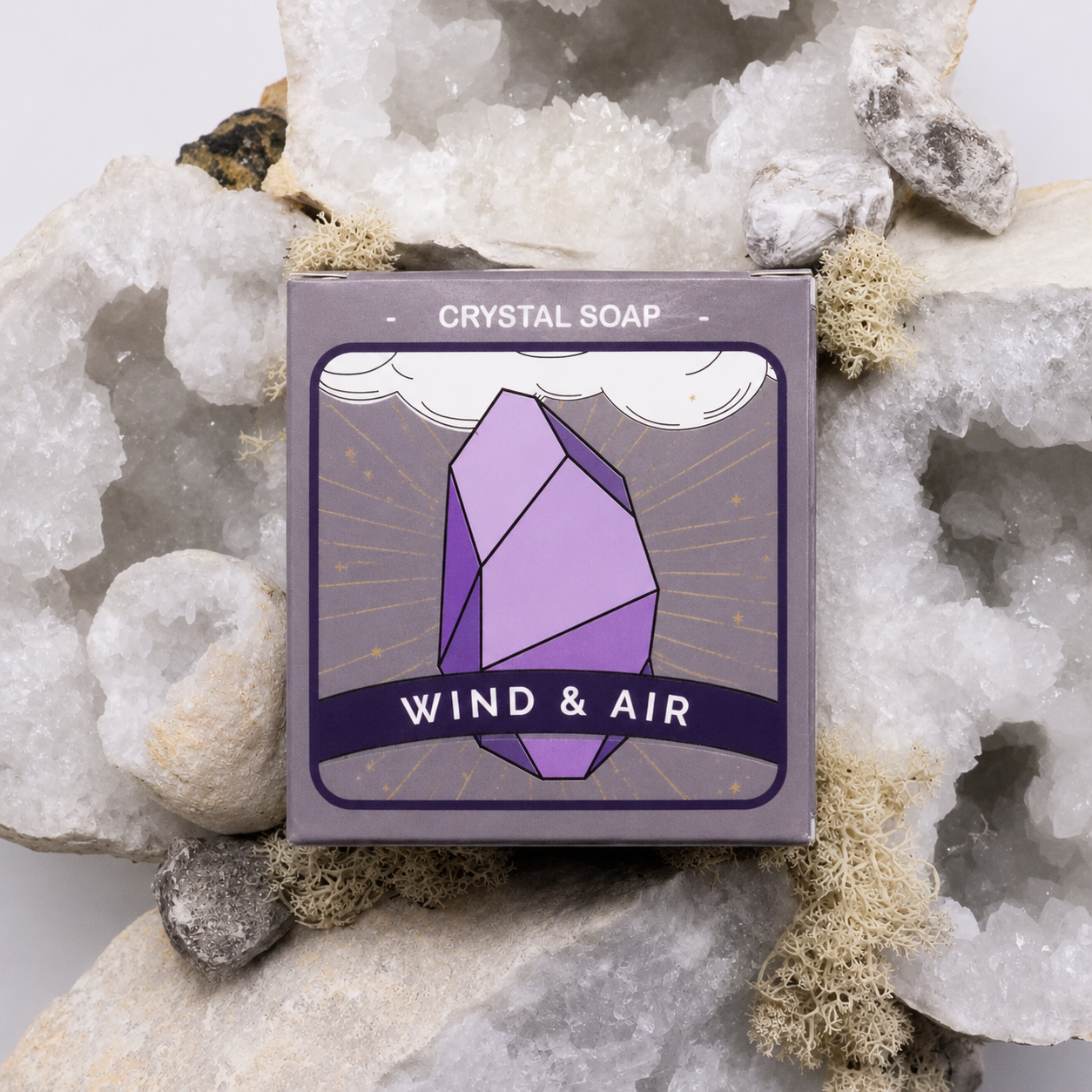 Crystal soap packaging with 'Wind & Air' branding on a rocky background