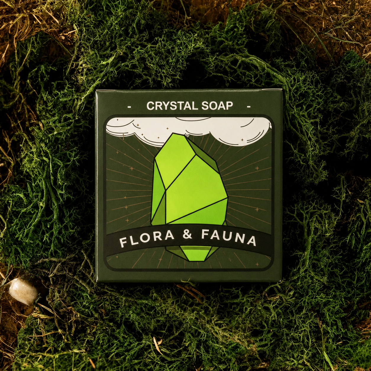 Crystal soap packaging with 'Flora & Fauna' branding on a green leafy background