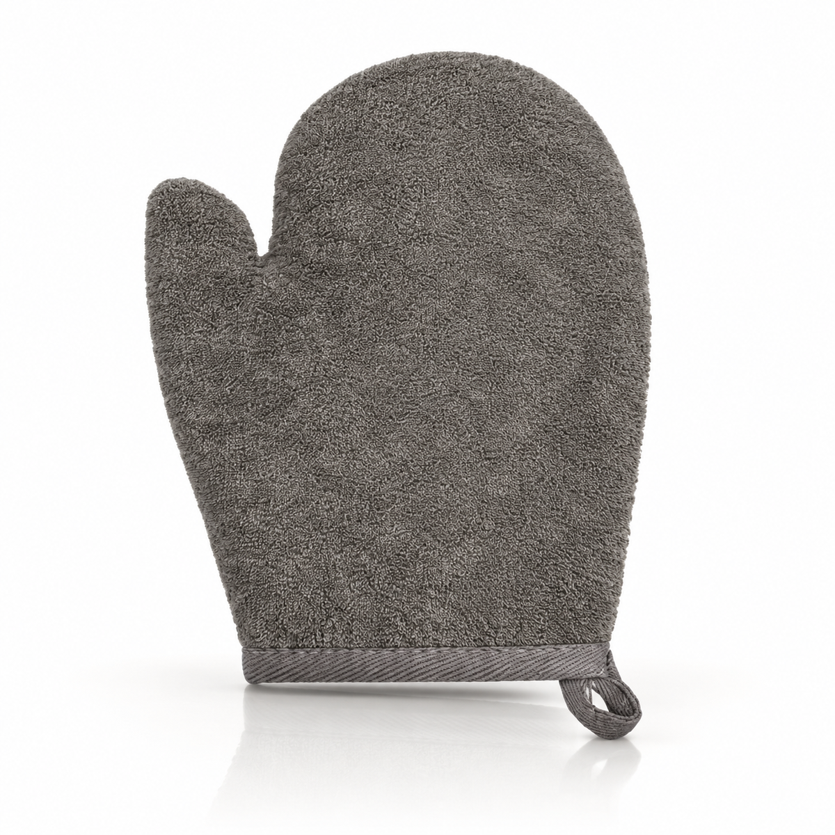 Reverse side of a charcoal-grey bamboo and linen bath glove on a white background with a soft reflection.
