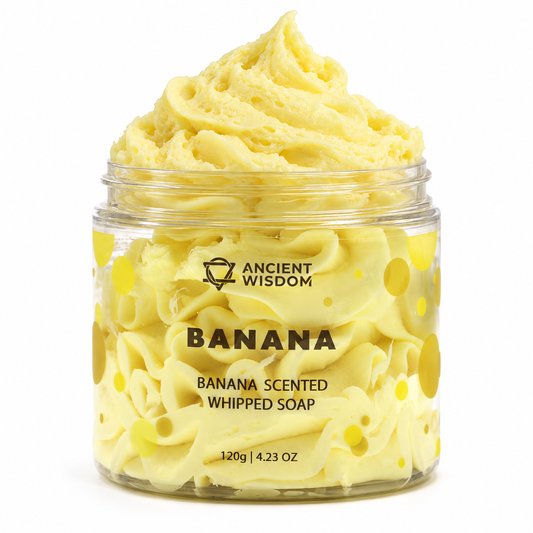 Open jar of Banana Scented Whipped Soap 120g with a soft, creamy yellow whipped texture