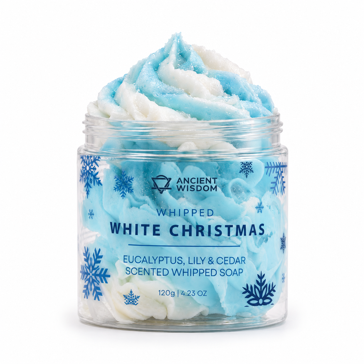 Open jar of icy blue and white White Christmas Whipped Soap with snowflake decorations and clear Ancient Wisdom branding on a white background.