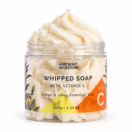 Ancient Wisdom Aromatherapy Whipped Soap with Vitamin C and orange and lemon essential oils in an open jar on a clean white background.