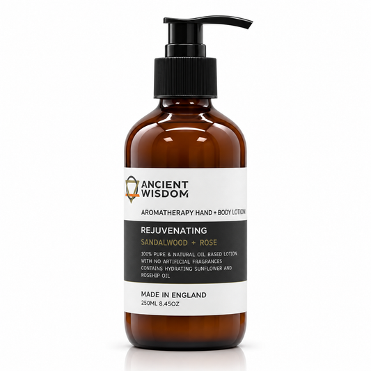 Ancient Wisdom Rejuvenating Aromatherapy Hand & Body Lotion with Sandalwood and Rose in a 250ml amber glass pump bottle.