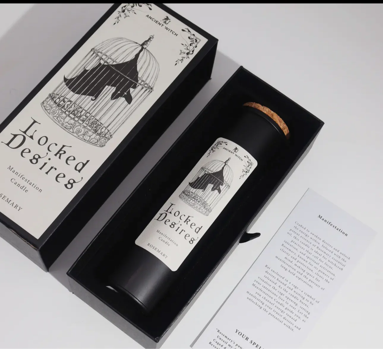 Lumaysa Locked Desires Ritual Candle presented in an open gift box with rosemary ritual description card – premium manifestation candle.