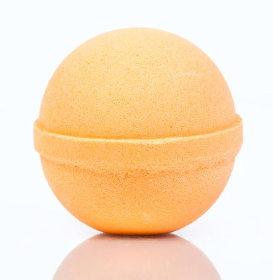 Orange bath bomb on a white background