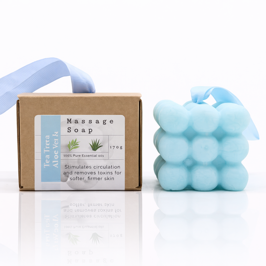 Bubble massage soap with Tea Tree and Aloe Vera packaging on white background with soft reflection and clean spa aesthetic