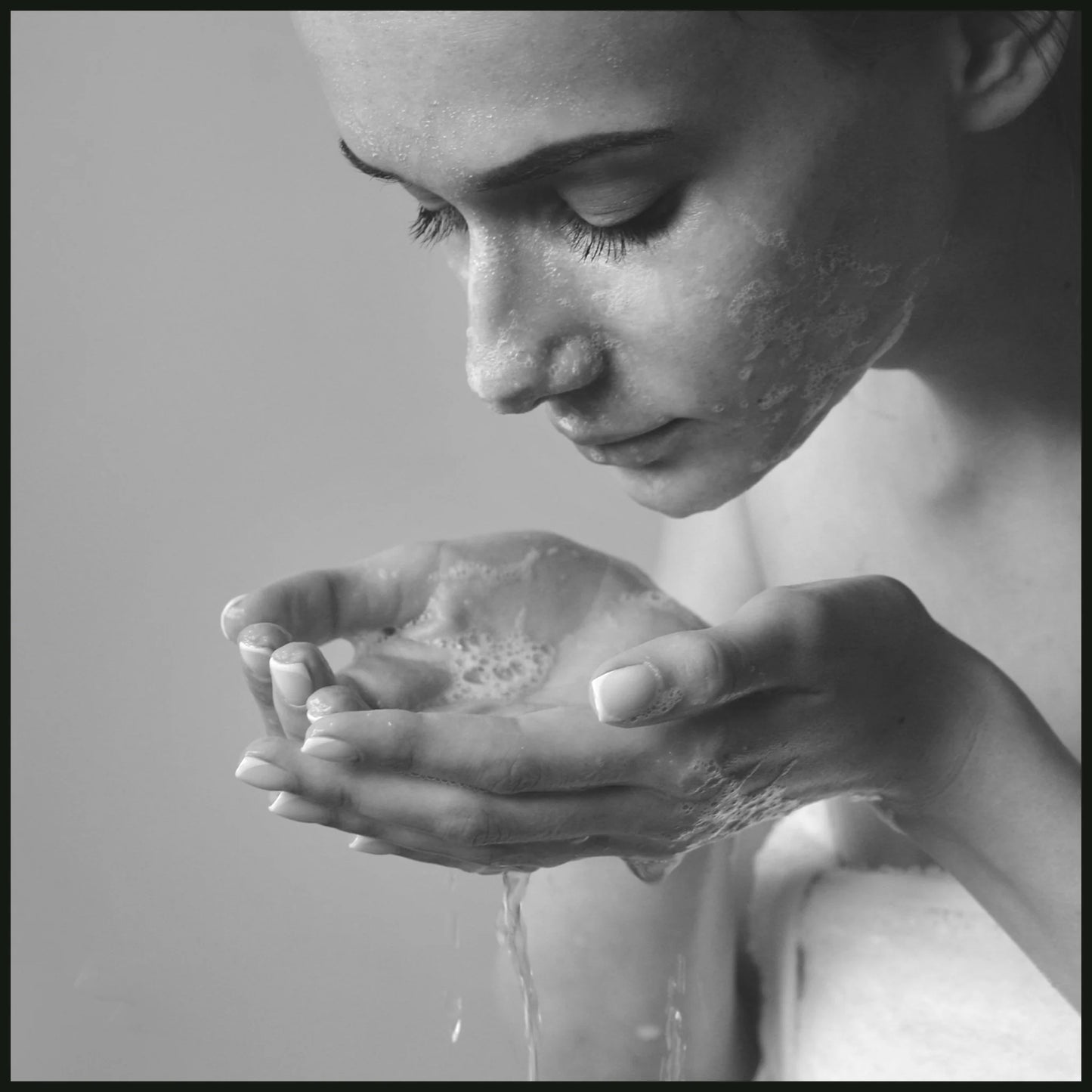 Woman using Lumaysa Konjac Facial Sponge for gentle daily cleansing and mindful skincare routine