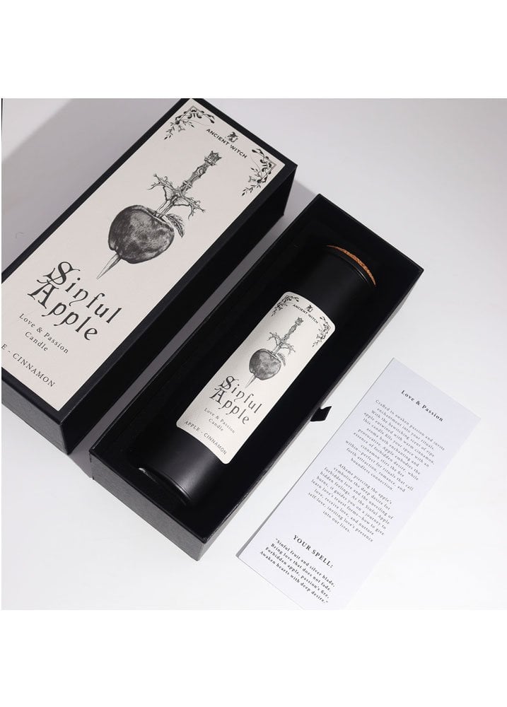 Sinful Apple love and passion ritual candle with symbolic spell card and luxury gift packaging
