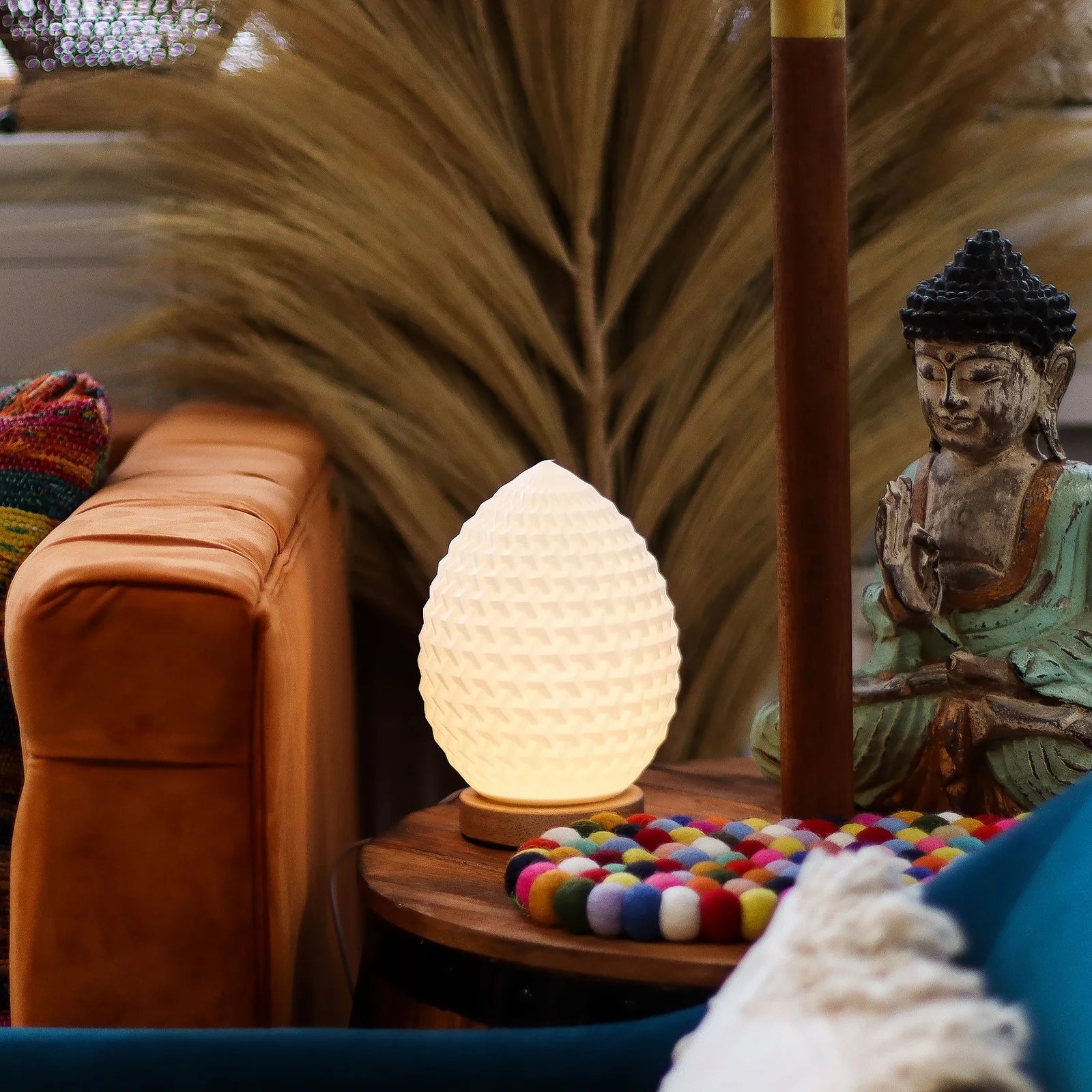 Lumaysa Aura Drop decorative table lamp creating a calm, cozy ambiance in a modern living space