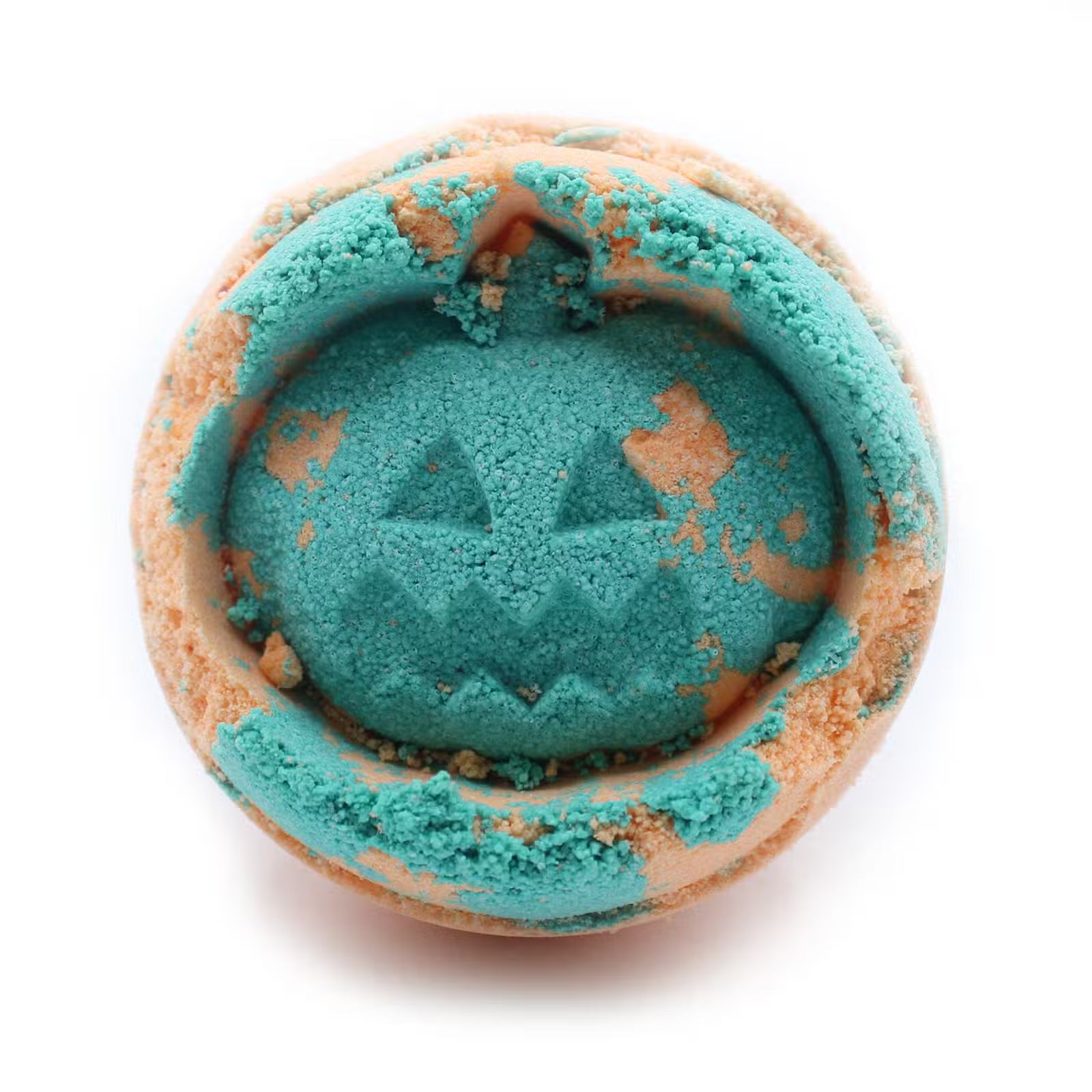 Lumaysa Wicked Zest fennel & orange Halloween bath bomb with jack-o’-lantern design, handmade vegan bath bomb on a clean white background