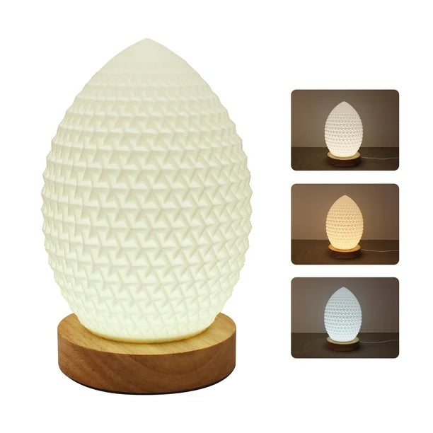 Lumaysa Aura Drop modern table lamp showcasing textured surface and three warm LED light settings