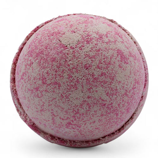 Pink jumbo bath bomb from Lumaysa Random Bliss gift set, handmade colourful bath bomb close-up on clean white background