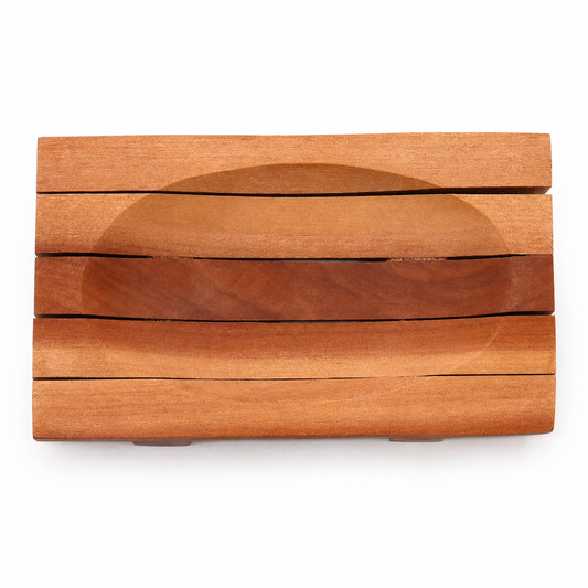 Wooden soap dish with a curved design on a white background