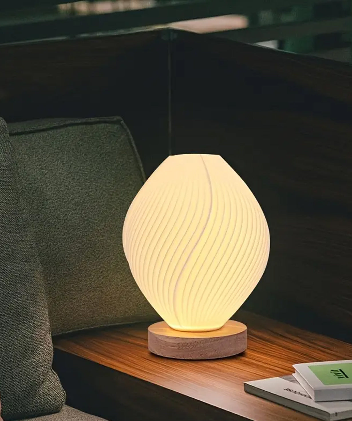 Lumaysa Shell Flow sculpted ambient table lamp with a flowing shell design and warm lighting, perfect for modern interior decor.