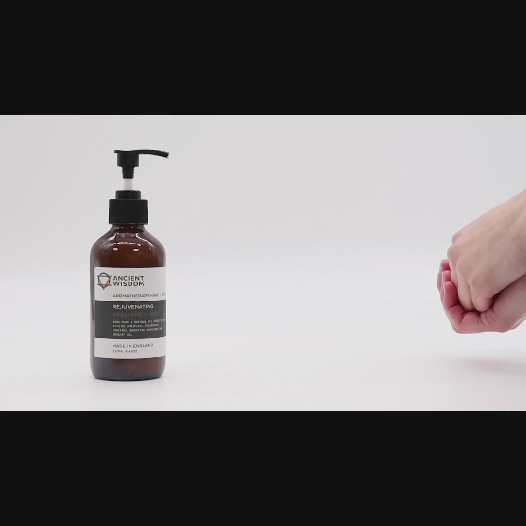 A woman applying aromatherapy hand and body lotion, followed by a display of amber glass pump bottles