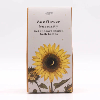 Front view of Lumaysa Sunflower Serenity heart bath bomb gift set packaging with sunflower design and passion fruit fragrance branding