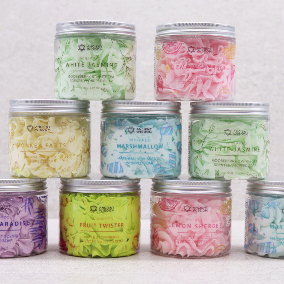 Assorted Lumaysa whipped cream soaps – colourful whipped soap jars displayed in a stacked arrangement.
