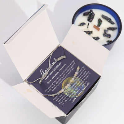 Open Lumaysa Gemini Zodiac Harmony candle gift box showing crystal soy wax candle and gemstone bracelet inside