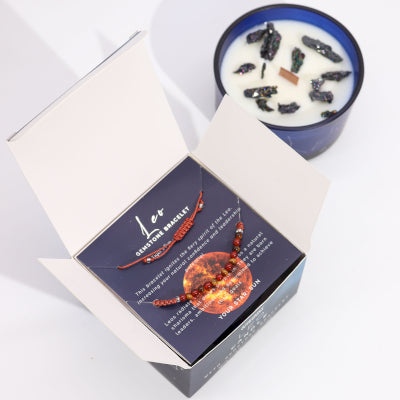 "Lumaysa Leo Zodiac soy candle gift set with gemstone bracelet displayed inside luxury astrology-inspired packaging"